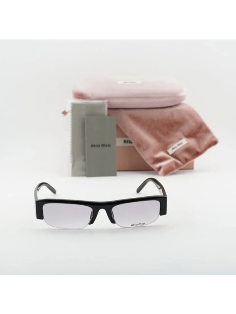 Miu Miu MUB07S 16K04O Sunglasses Black Rectangle Frame, Grey Filter